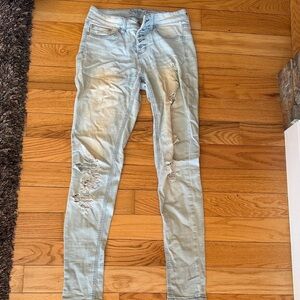 Light Wash Distressed Women's Jeans - Slim Fit